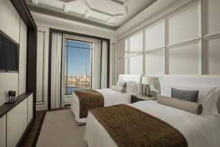 Отель The St. Regis Astana Нур-Султан Двухместный номер Делюкс с 2 отдельными кроватями-11